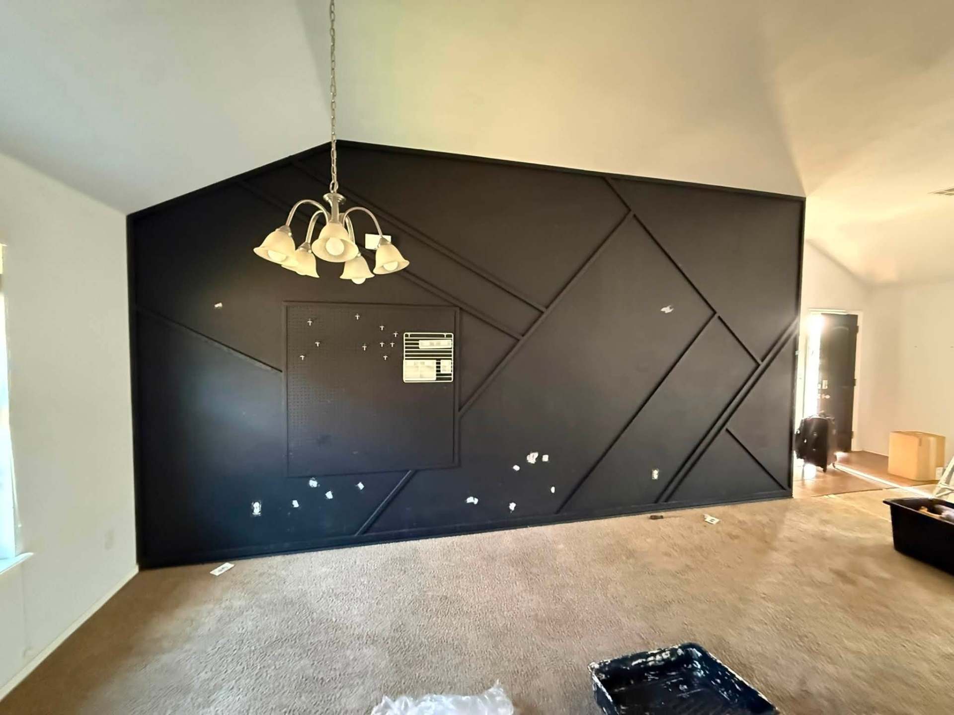 Finished black geometric accent wall by Box L Painting Services